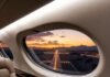Inside the World of Luxury Travel Operators: What They Offer & Why It Matters Luxury private jet sunset landing view.