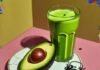 Vegan Breakfast Options: Healthy Recipes to Start Your Day Right Overripe avocado spills on cracked plate with sweaty green smoothie and melting clock.