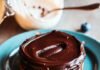 Vegan Dessert Ideas: Simple and Delicious Recipes for Every Occasion Lopsided vegan chocolate tart with thumbprint, spilled coconut cream