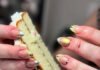 Special Occasion Nail Art Trends You’ll See Everywhere This Year Chaotic post-party hand holding greasy wedding cake slice