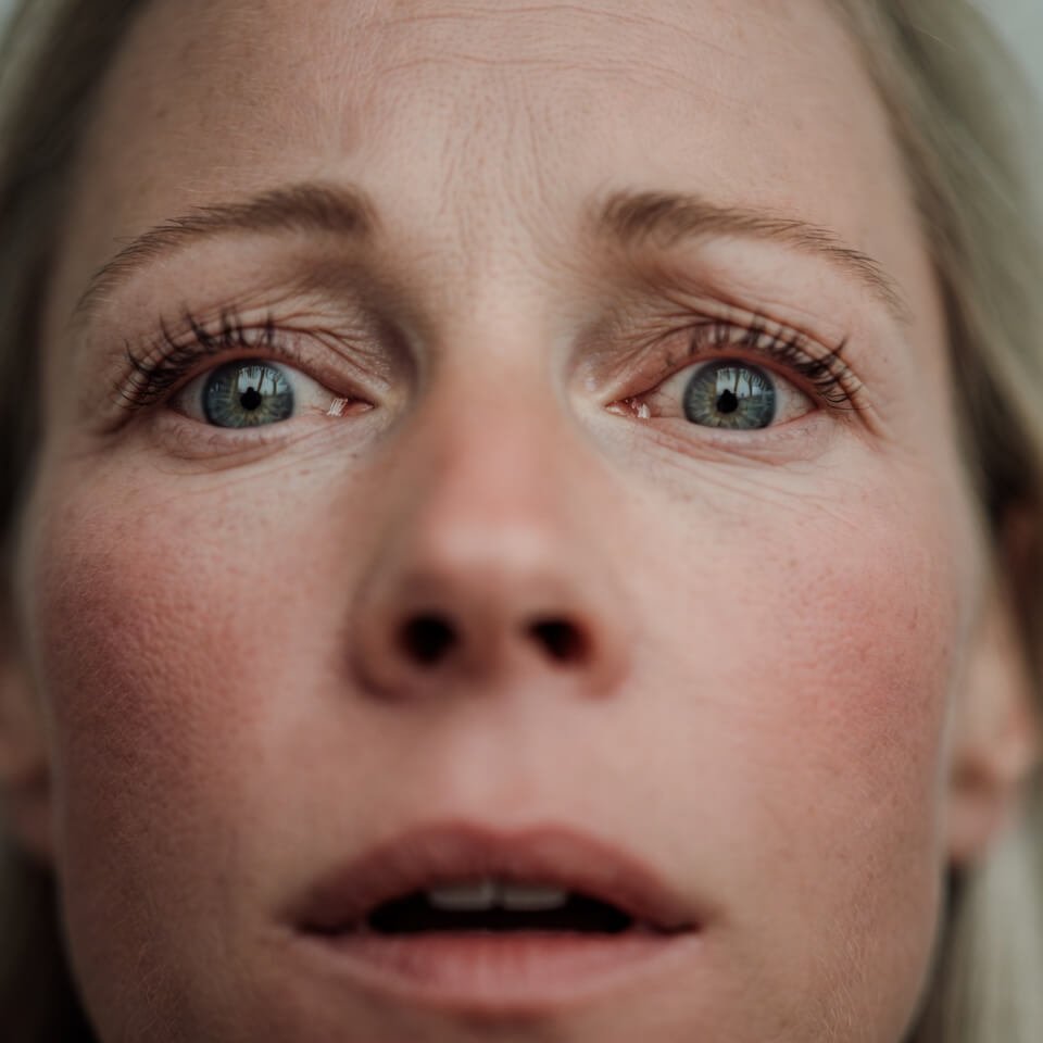 Extreme close-up of shocked face realizing no garlic